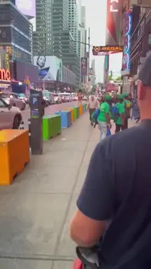 Naked woman running from cops in Times Square