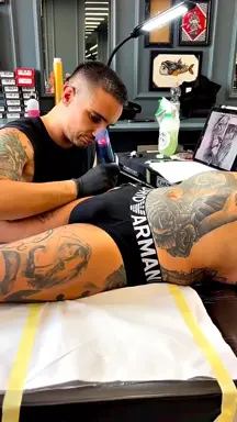 Tattoo artist just doing his job